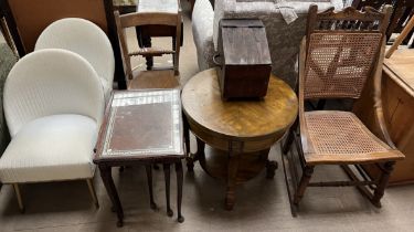 A pair of wicker effect chairs together with a nest of three tables, a kitchen chair,