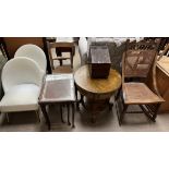 A pair of wicker effect chairs together with a nest of three tables, a kitchen chair,