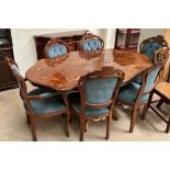A modern inlaid dining table together with a set of six dining chairs and a sideboard