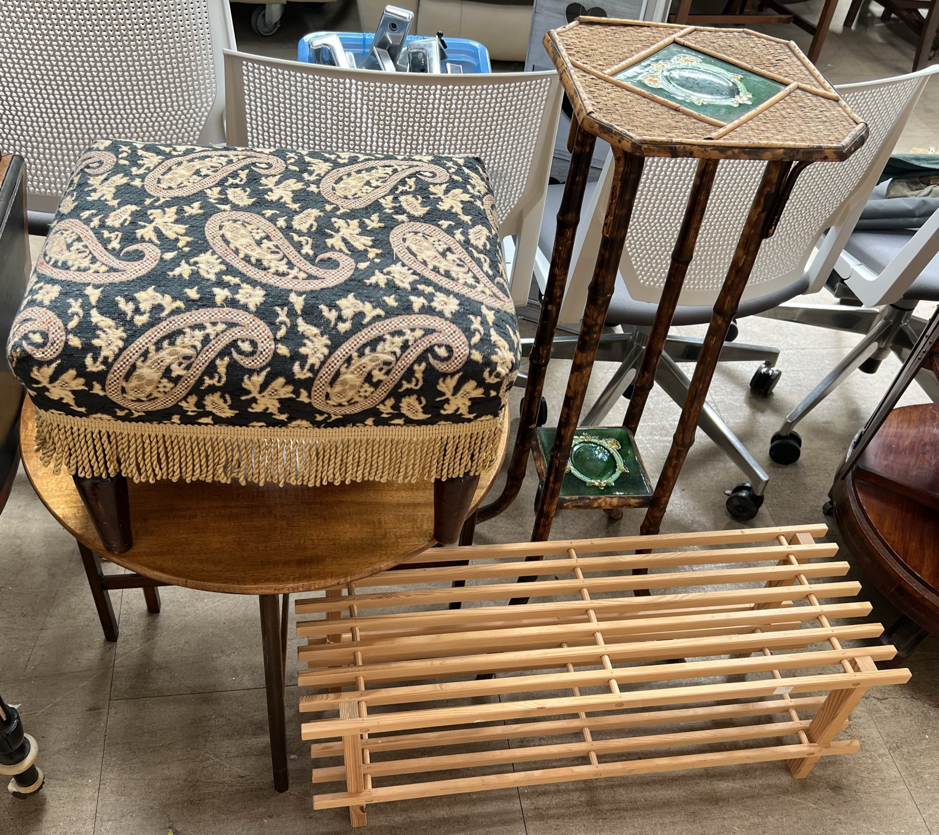 A bamboo plant stand with a tile inset top and shelf, together with a folding table,