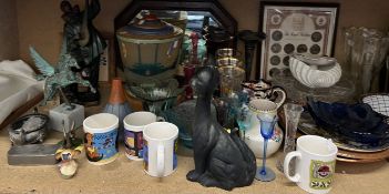 A glass lamp shade together with an oak framed wall mirror, Poole pottery, Masons jug, framed coins,