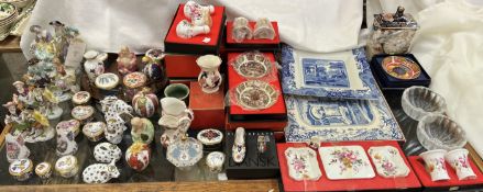 A collection of Royal Crown Derby paperweights together with assorted porcelain boxes and covers,