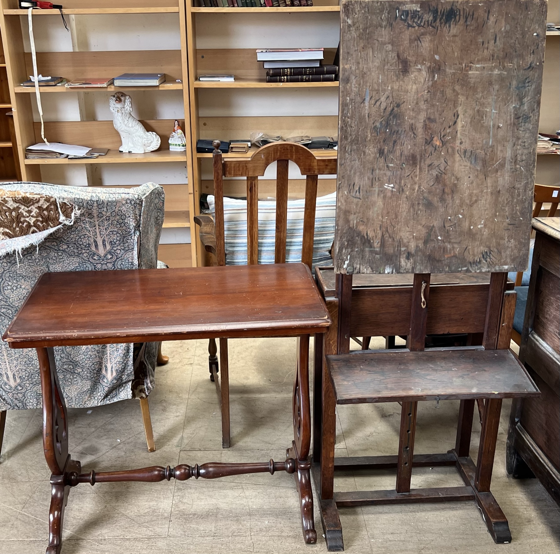 An oak artists easel together with a Victorian occasional table