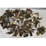 A large collection of coins including Pennies, Two Shillings,