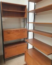 A pair of mid 20th century Interflex teak bookcases, one with a bureau and base cupboards,