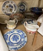 A collection of Spode pottery plates,