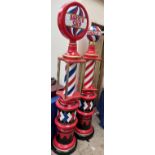 Two Barber Shop Poles in usual colours with turned columns and glass shelves, 2005cm high,