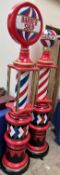 Two Barber Shop Poles in usual colours with turned columns and glass shelves, 2005cm high,