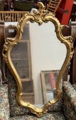 A 19th century style gilt wall mirror of roccoco form