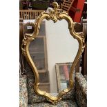 A 19th century style gilt wall mirror of roccoco form