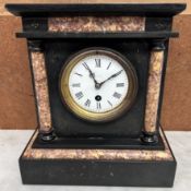 A black slate mantle clock,