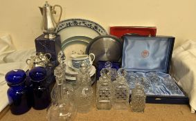 A set of four Thomas Webb crystal glasses, boxed together with a Royal Doulton crystal decanter,