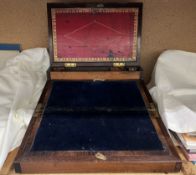 A 19th century mahogany laptop desk, with a pen tray and ink wells,