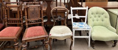 A pair of hall chairs with a caned back together with a Victorian balloon back dining chair,