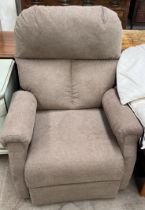 An upholstered reclining electric chair