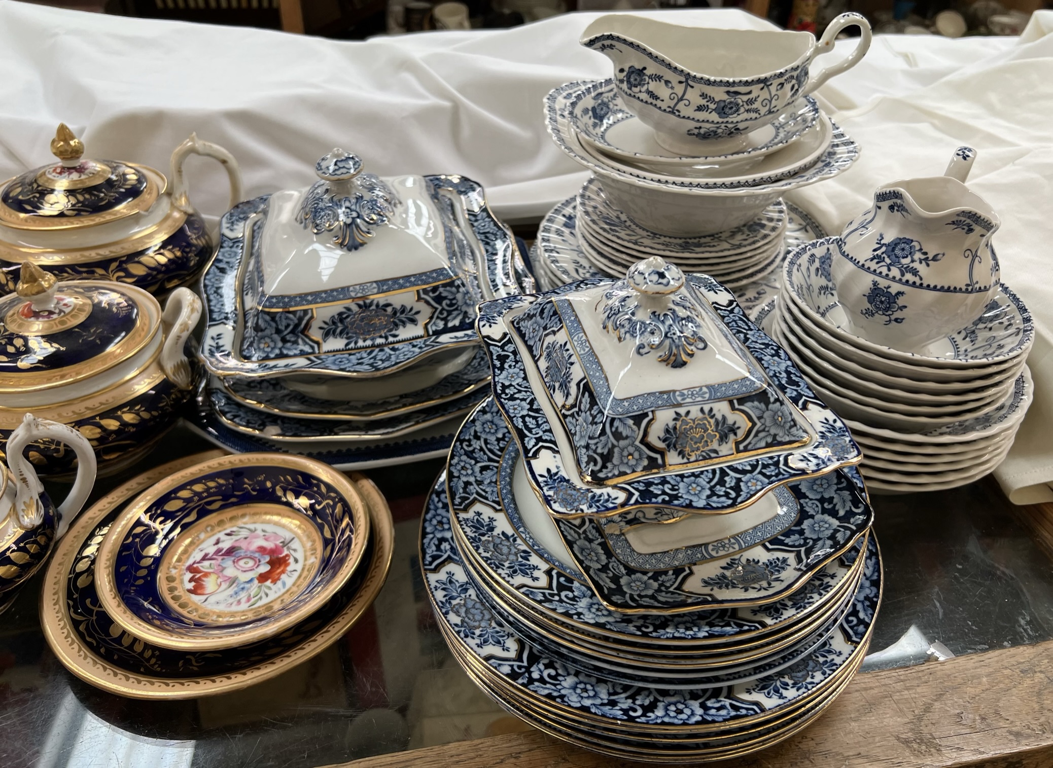 A 19th century pottery floral decorated part tea service together with blue and white part dinner - Image 2 of 3