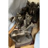 A collection of moulded resin racehorse models