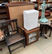 A cast iron painted stick stand together with a tripod table, a Lloyd Loom laundry basket,