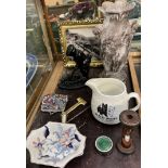 A golfer door stop together with a pottery jug, candle snuffer, vase, photograph,