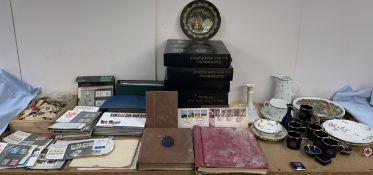 A collection of First Day Covers together with Mint stamps, stamp albums, loose stamps,