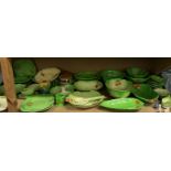 A large collection of Beswickware, Crown Devon, Carltonware and other pottery leaf decorated plates,
