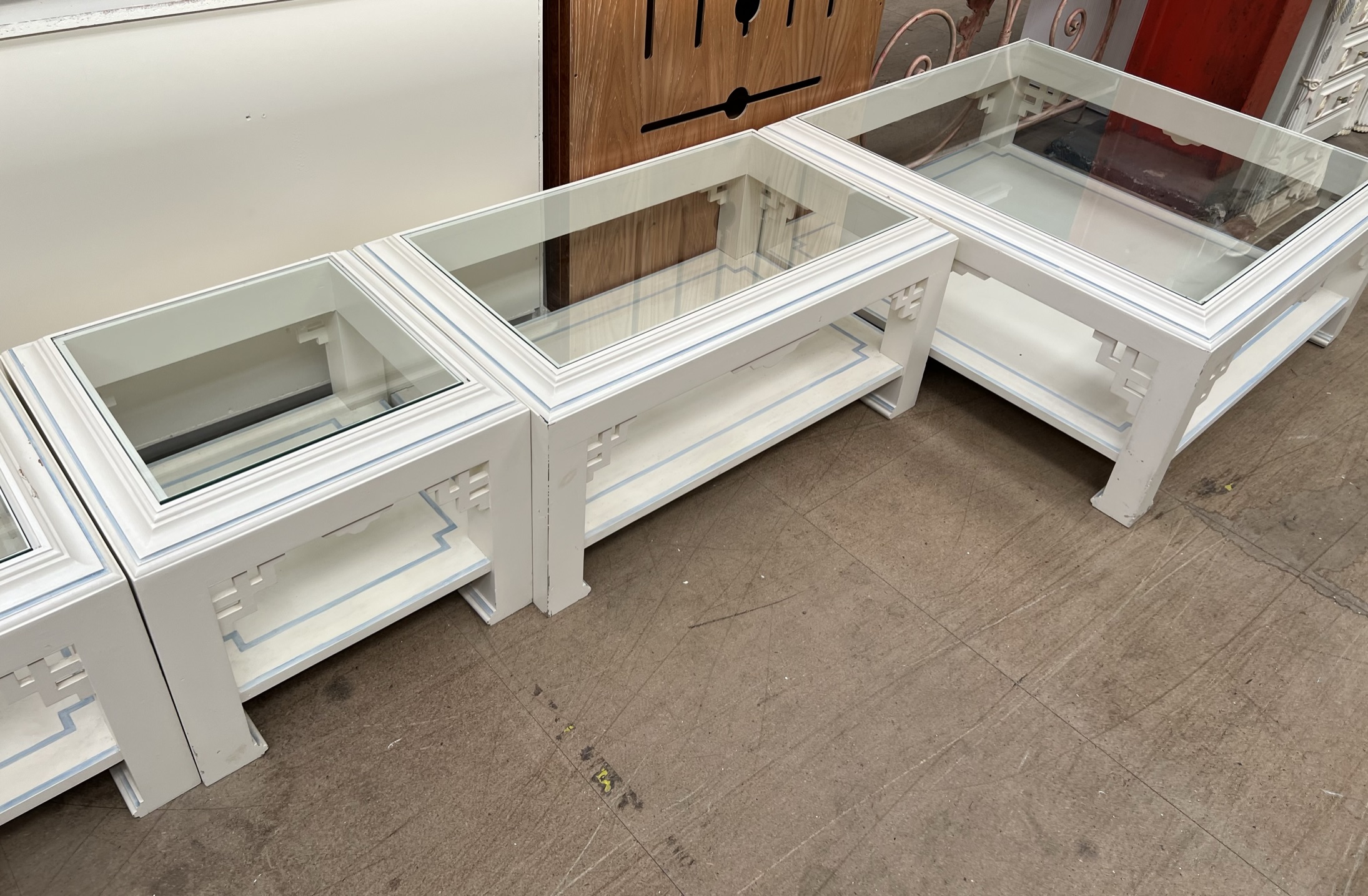 A set of five cream and blue painted glass topped coffee tables of varying sizes - Image 3 of 3