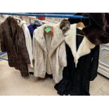 A collection of fur and other Lady's coats,