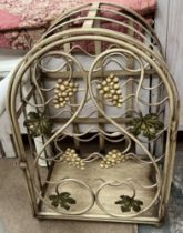 A metal wine rack of domed form,