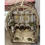 A metal wine rack of domed form,