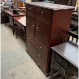 A reproduction mahogany effect dressing table with matching tall boy,