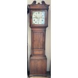 A 19th century oak longcase clock, with a broken swan neck pediment and square pillars, the 35.