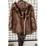 A fur jacket together with two fur stoles