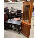 A 20th century oak desk together with a standing corner cupboard