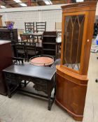 A 20th century oak desk together with a standing corner cupboard