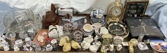 A glass punch bowl and glasses together with part tea sets, clocks,