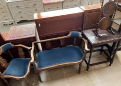 An Edwardian mahogany two seater settee together with a matching corner chair,