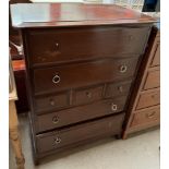 A Stag chest of drawers on bracket feet