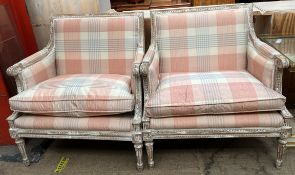 A pair of continental upholstered arm chairs with cream and pink chequer upholstered back seat and