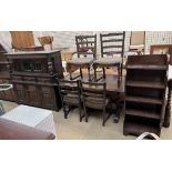 A 20th century oak refectory table and four chairs together with an oak court cupboard and a