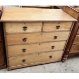 An Edwardian ash chest with a rectangular top above two short and three long drawers on bracket