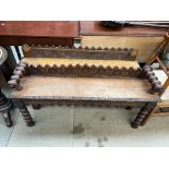 A pair of late 19th century oak hall benches,