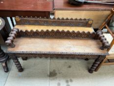 A pair of late 19th century oak hall benches,