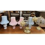 Two pairs of pottery table lamps together with two other table lamps