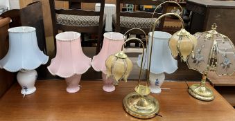 Two pairs of pottery table lamps together with two other table lamps
