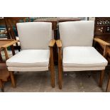 A pair of mid 20th century Parker Knoll elbow chairs CONDITION REPORT: Post 1950’s