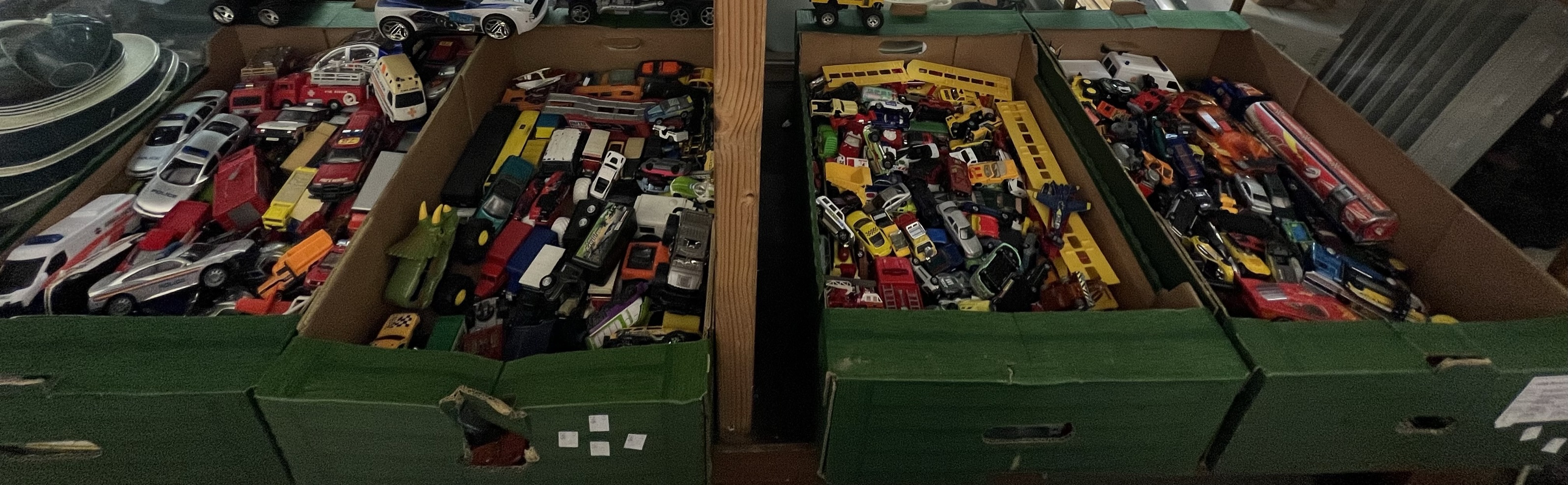 A large collection of model vehicles including LLedo, Teamster, Majorette, Matchbox,