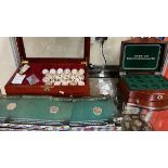 Two coin cases together with American gilt coin, and Scagawea U.S.