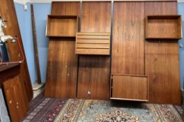 A Danish teak modular shelving unit with a chest,