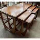 A G Plan teak nest of three tables together with another teak nest of tables
