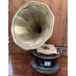 A reproduction HMV gramophone with brass trumpet